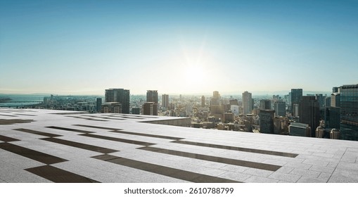 Perspective view of modern rooftop empty concrete floor and city view during sunrise. 