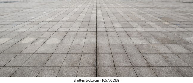 Perspective View Of Monotone Gray Brick Stone On The Ground For Street Road. Sidewalk, Driveway, Pavers, Pavement In Vintage Design Flooring Square Pattern Texture Background