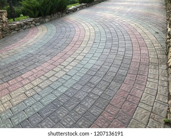 Perspective View Monotone Gray Brick Stone Pavement On The Ground For Street Road. Sidewalk, Driveway, Pavers, Green Grass