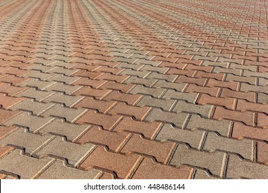 Perspective View Of Monotone Gray Brick Stone On The Ground For Street Road. Sidewalk, Driveway, Pavers, Pavement In Vintage Design Flooring Square Pattern Texture Background