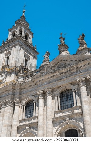 Perspective view of neoclassical bell tower and main façade at Lugo Cathedral, Spain