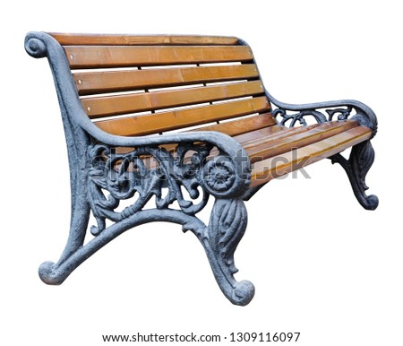 Perspective view on a brown wooden bench with wrought legs with ornate patterns, isolated on a white background (design element)