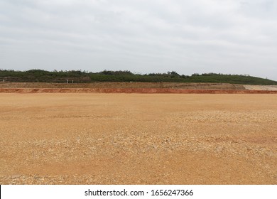 Perspective View Of Open And Level Dirt Ground