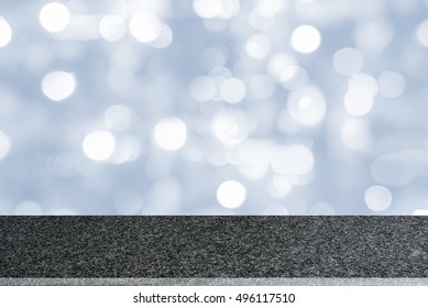 Perspective View Of Polished Granite Countertop / Table Top With White Bokeh Background. Stone Slab Used For Several Purposes I.e Professional Montage, Editing, Processing Of Photographs, Display, Etc