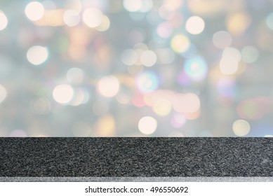 Perspective View Of Polished Granite Countertop / Table Top With White Bokeh Background. Stone Slab Used For Several Purposes I.e Professional Montage, Editing, Processing Of Photographs, Display, Etc