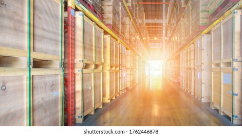 perspective view of warehouse interior with goods and merchandising store and stacking on shelves, selective focused with sun flare - Shutterstock ID 1762446878