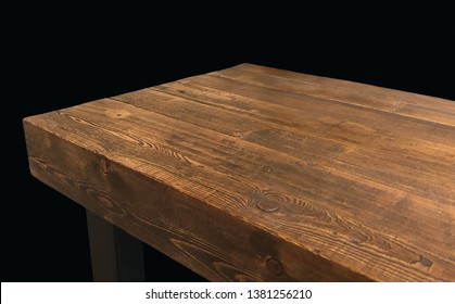 Perspective view of wood or wooden table corner on black background including clipping path