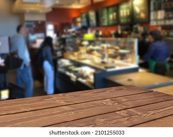 Perspective View Of Wooden Table Corner In Cafe Or Coffee Shop