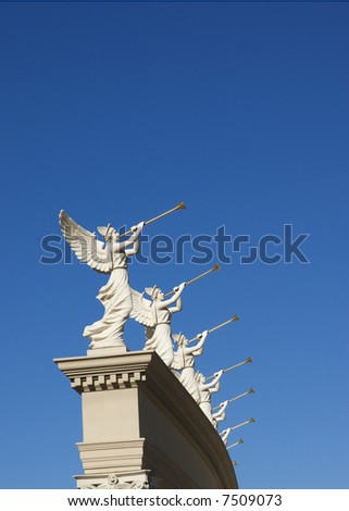 Perspective of winged trumpeters with golden trumpets
