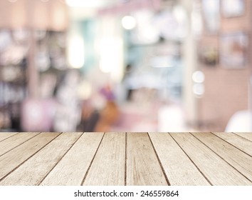 Perspective wood and blurred cafe with bokeh light background. product display template - Shutterstock ID 246559864