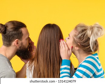 Persuasion concept. Man and woman whispering in girls ear. Copy space on yellow background.