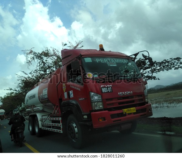 \
\
A Pertamina fuel tanker truck crosses\
the Cilacap highway, Sunday, October 4\
2020
