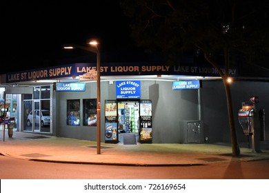 Perth, Australia - May 30, 2017: View Of A Liquor Store On A City Centre Street At Night.