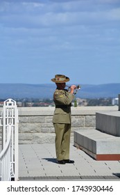 Perth, Australia- Nov 2019: Bugle Player Sounds The Last Post To Commemorate Remembrance Day On The 11th Of November At 11 Am