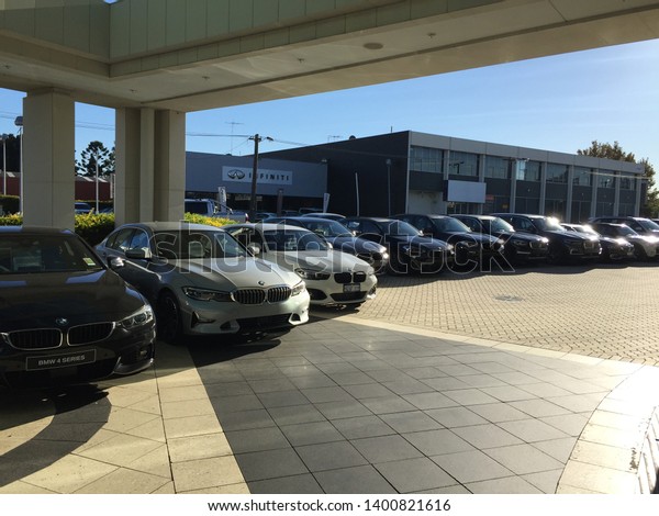 Perth, Australia-18/5/19: a row of bmw cars at an\
auto classic shop