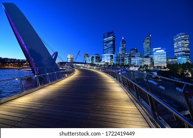 Perth Financial District Skyline As View From Elizabeth Quay Pedestrian Bridge At Night In Perth, Western Australia.Empty.  No People. Copy Space