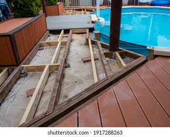 Perth, WA - Australia 01-23-2021 Repairing and installing new decking around a Swimming Pool.