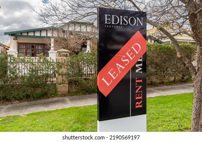 Perth, Western Australia - August 14 2022: 'for Rent' Sign On Australian Residential Property With 'leased' Sticker.