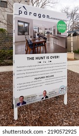 Perth, Western Australia - August 14 2022: 'for Sale' Sign On Australian Residential Property With 'under Offer' Sticker.