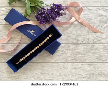 Perth - Western Australia, August 2014. Swarovski jewellery gold bracelet on the gift box. Best gift for love one. 