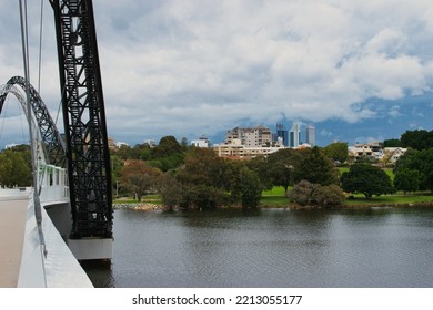 PERTH, WESTERN AUSTRALIA - June 22th, 2022: The Matagarup Bridge Over The Swan River In Perth City CBD. On A Cloudy Day During The COVID 19 Pandemic.