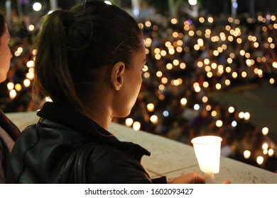 Perth, Western Australia / Australia - Sept 9 2015: Young Woman Holds Candle In Candle Light Vigil For Refugees