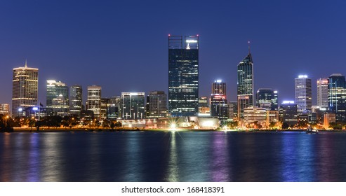 Perth, Western Australia, viewed at night reflected in the Swan River. - Shutterstock ID 168418391
