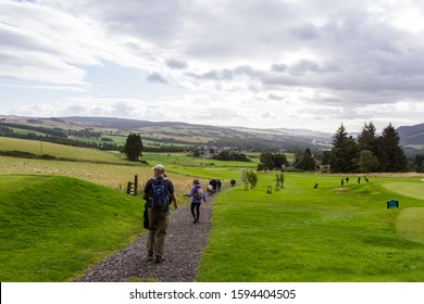 Perthshire Scotland  - September 11 2019: Hikers Walking Thru The Pitlochry Golf Course In The Scottish Highlands, UK September 11,  2019