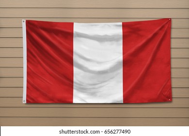 Peru Flag Hanging On A Wall