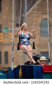 Peru, Indiana, USA - July 21, 2018 Older Woman Wearing  Circus Outfit On A Float Wearing A Beauty Crown At The Circus City Festival Parade