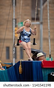 Peru, Indiana, USA - July 21, 2018 Older Woman Wearing  Circus Outfit On A Float Wearing A Beauty Crown At The Circus City Festival Parade