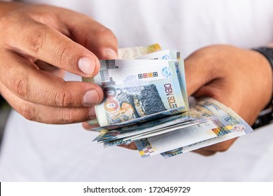 Peruavian money, sol peruano in different situations. Monedas y billetes peruanos en diferentes situaciones. - Shutterstock ID 1720459729