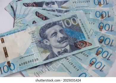 Peruvian currency; one hundred dollar bills - Shutterstock ID 2025031424