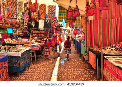 Peruvian Family Walking In Local Market