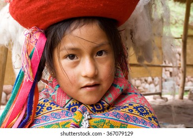 Peruvian Kids In Inca Settlement On 3000m High Mountain, Pisac, Sacred Valley (Valle Sagrado), Peru, March 18, 2009