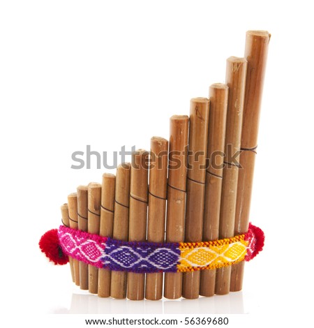 Peruvian pan flute or pipe isolated over white