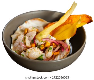 Peruvian White Fish Ceviche With Pepper, Chickpeas And Fried Bananas. Isolated Over White Background