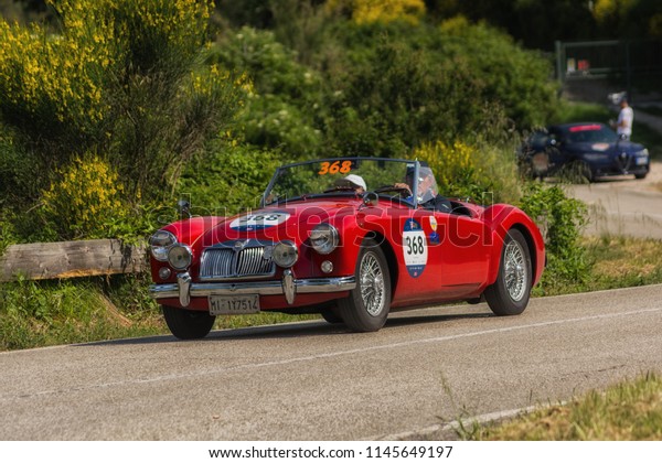 PESARO COLLE SAN BARTOLO , ITALY - MAY\
17 - 2018 : MG A	1956 on an old racing car in rally Mille Miglia\
2018 the famous italian historical race\
(1927-1957)
