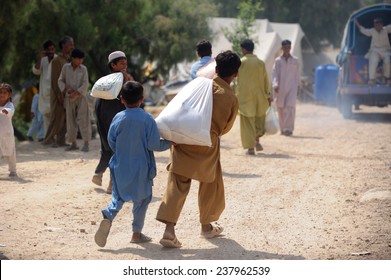 PESHAWAR, PAKISTAN - SEPT 09: Flood victims assistance  Peshawar, Pakistan on September 09, 2010.