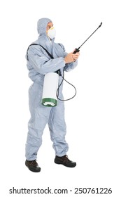 Pest Control Worker In Protective Workwear With Pesticides Sprayer Over White Background