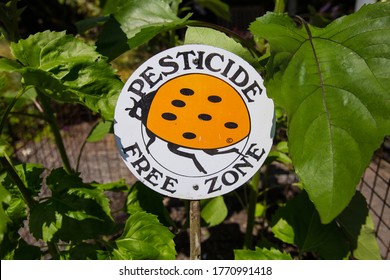 Pesticide Free Zone Sign In The Garden
