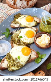 Pesto eggs, eggs, fried in basil pesto , sunny side up