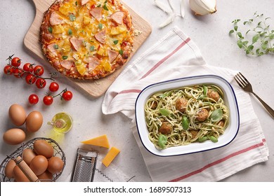 Pesto Pasta With Meatballs & Thin Crust Hawaiian Pizza Flatlay