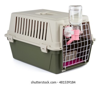 Pet carrier with feeding and watering supply for long transportation isolated on white