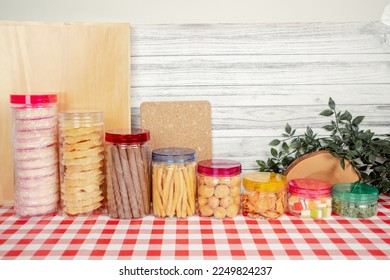 PET cylinder jar series for cookies or snack packaging with colorful transparant PET cap. - Shutterstock ID 2249824237