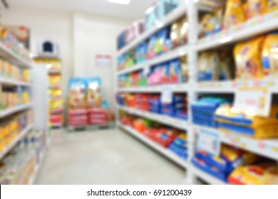 Pet Food Package On Shelf In Shop Feed Or Pet Food Store, Abstract Blurred Background