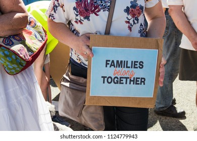 Petaluma, CA/USA-June 30, 2018: Woman Holds Small Sign - Families Belong Together- Sign During Keep Families Together March