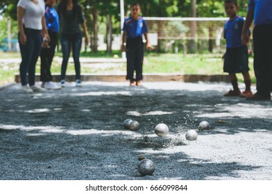 Petanque Is A Famous Leisure Activity In Asian Countries.