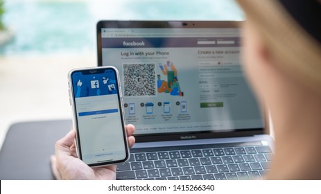 PETCHABURI, THAILAND-MAY 13, 2019: Facebook social media app icon signup page on iphone XR mobile smartphone device and computer laptop for user FB live public communication network.