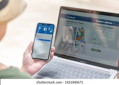 PETCHABURI, THAILAND-MAY 13, 2019: Facebook Social Media App Icon Signup Page On Iphone XR Mobile Smartphone Device And Computer Laptop For User FB Live Public Communication Network.